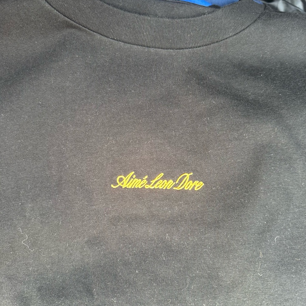 Aime Leon Dore script logo tee